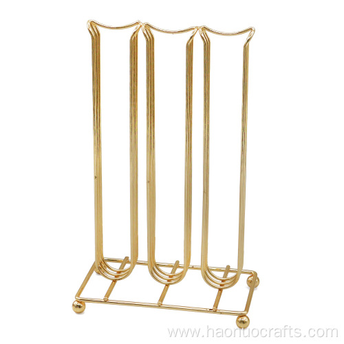 Electroplated gold capsule storage rack